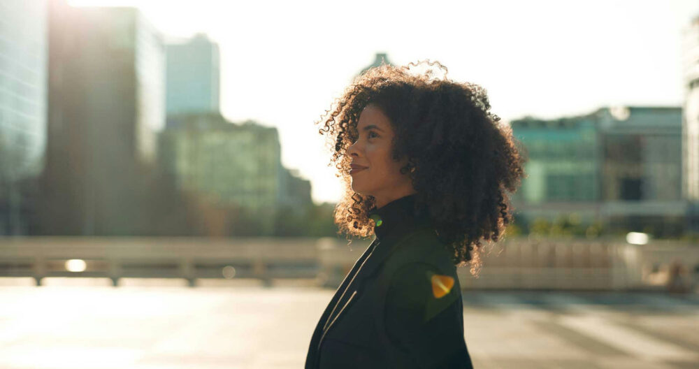 a-woman-smiling-outside